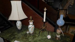 A pair of Oriental table lamps, onyx table lamp and wrought iron table lamp