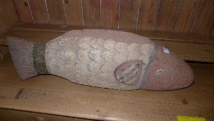 A carved African painted wooden Bobo fish
