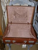 A 1920's leather suitcase