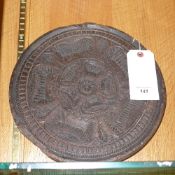 A late C17th oak carved cheese mould wit