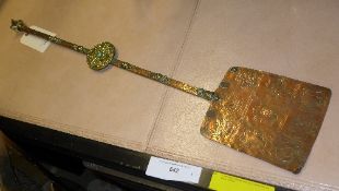 A Tibetan copper and brass ceremonial pi