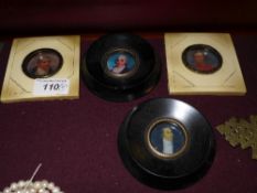 A set of four framed miniature profiles