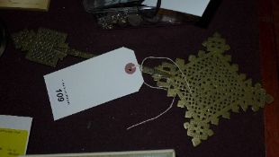 A brass Ethiopian religious cross