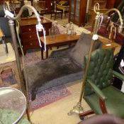 A set of three brass standard lamps