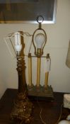 A set of four assorted table lamps