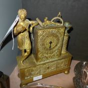 A Regency ormolu mantle clock with figure and Masonic relief (no movement)