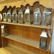 A set of chrome and glass lanterns