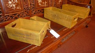 A collection of four stained pine fruit boxes