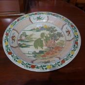 A Chinese charger of large size decorated with landscape reserves