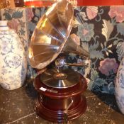 An old HMV style gramaphone of cylindrical form