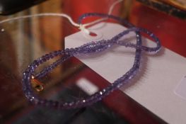A tanzanite necklace on a 9 ct gold clasp