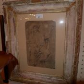 A print of a charcoal study in a gilt and gesso frame