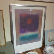 A glazed and framed James Cox exhabition poster