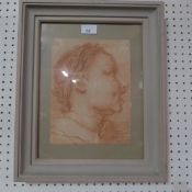 A C19th chalk portrait of a boy signed indistinctly bottom left glazed and framed