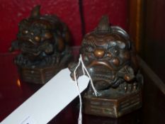 A pair of Chinese bronze Kylin figurines
