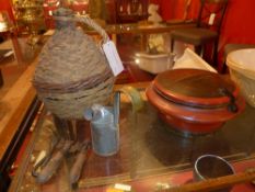 An Eastern lidded box together with a carboy some old tools and a milk measure