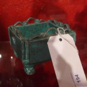 A Chinese green mottled glazed incense burner of square form on four feet