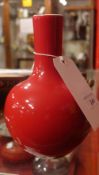 A Chinese red glazed vase with mark to base