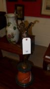 A bronze cast of an Art Deco dancer on marble base