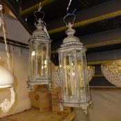 A pair of continental candle lanterns