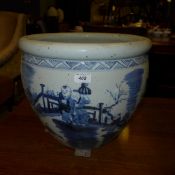 A large blue and white vase