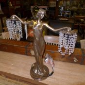 An Art Deco style maiden form bronzed table lamp with hanging lustres