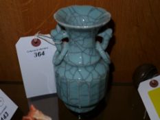A small Chinese style crackle glaze vase