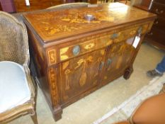 An early C19th Dutch marquetry side cabinet with frieze drawer above panel doors W 120 D 56 H 94 cm