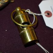 A brass Titanic whistle