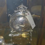 A silver plated incised biscuit barrel on splayed supports