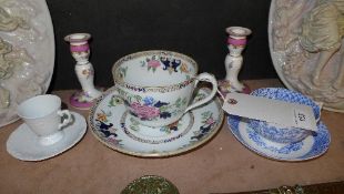 A Minton porcelain oversized tea cup and saucer, pair dwarf candlestick and others