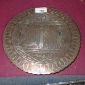 An Egyptian copper dish with silver inla