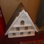 A stained pine and painted dove cot