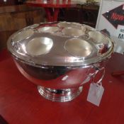 A large silver plated wine cooler for el