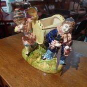 A porcelain figure group of musicians