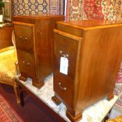 A pair of Art Deco walnut bedside chests