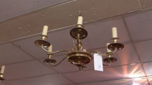 A brass six branch hanging chandelier