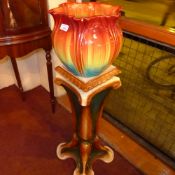 A Bretby jardiniere in brightly coloured