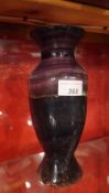 A purple crystal vase of baluster form
