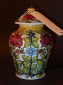 An Italian maiolica jar and cover decora