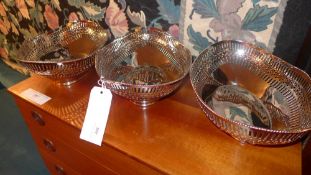 A set of three silver plated oval fruit