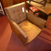 A pair of Art Deco armchairs of angular