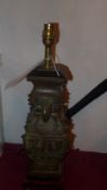 A Chinese bronze table lamp with ring ha