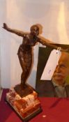 An Art Deco style bronze of a female dan