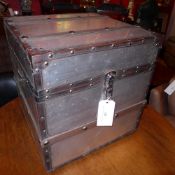 A steel clad storage trunk of cuboid form