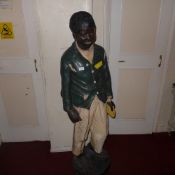 An early C20th painted plaster advertising figure