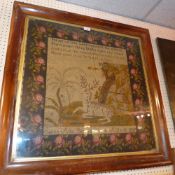 A Victorian glazed and framed sampler with image of a buck under a tree in rosewood frame