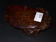 A faux amber paperweight