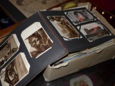 A quantity of various postcards and an album of post cards mostly of British and European churches