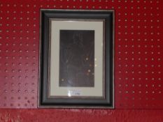 A glazed and framed Eric Gill print after a woodcut female nude study